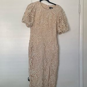 Beige lace dress from lulus. Only worn once. Has a slit on left knee